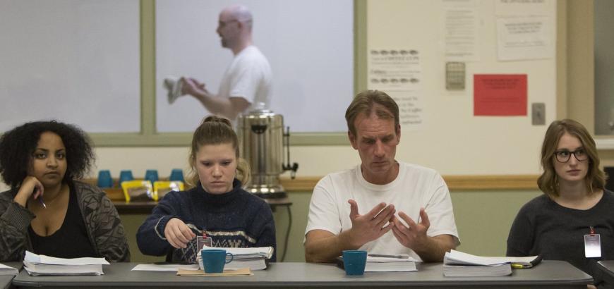 From left, UW students Meron Fikru, Emily Krueger, inmate Art Longworth and UW student Kathryn Joy give a presentation on prison reform. (Sy Bean/The Seattle Times)