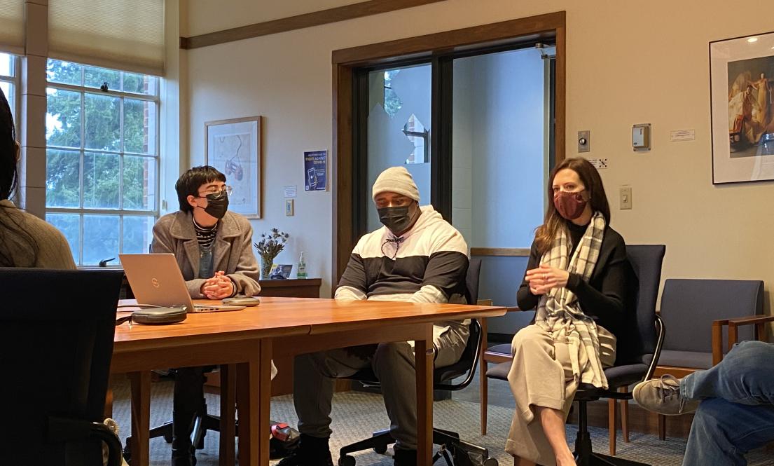 Formerly incarcerated person Jamar Beaver, center, shares his story with current students in the LSJ Juvenile Parole Project class, along with two members of his team, Ana Kelly (LSJ class of 2021), left, and Brittany Ward (LSJ class of 2012).
