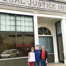 Bryce Ellis stands in front of the Equal Justice Initiative in Montgomery, Alabama with his parents