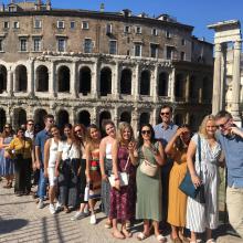 Former LSJ Rome students in front of the Colosseum in Rome, Italy